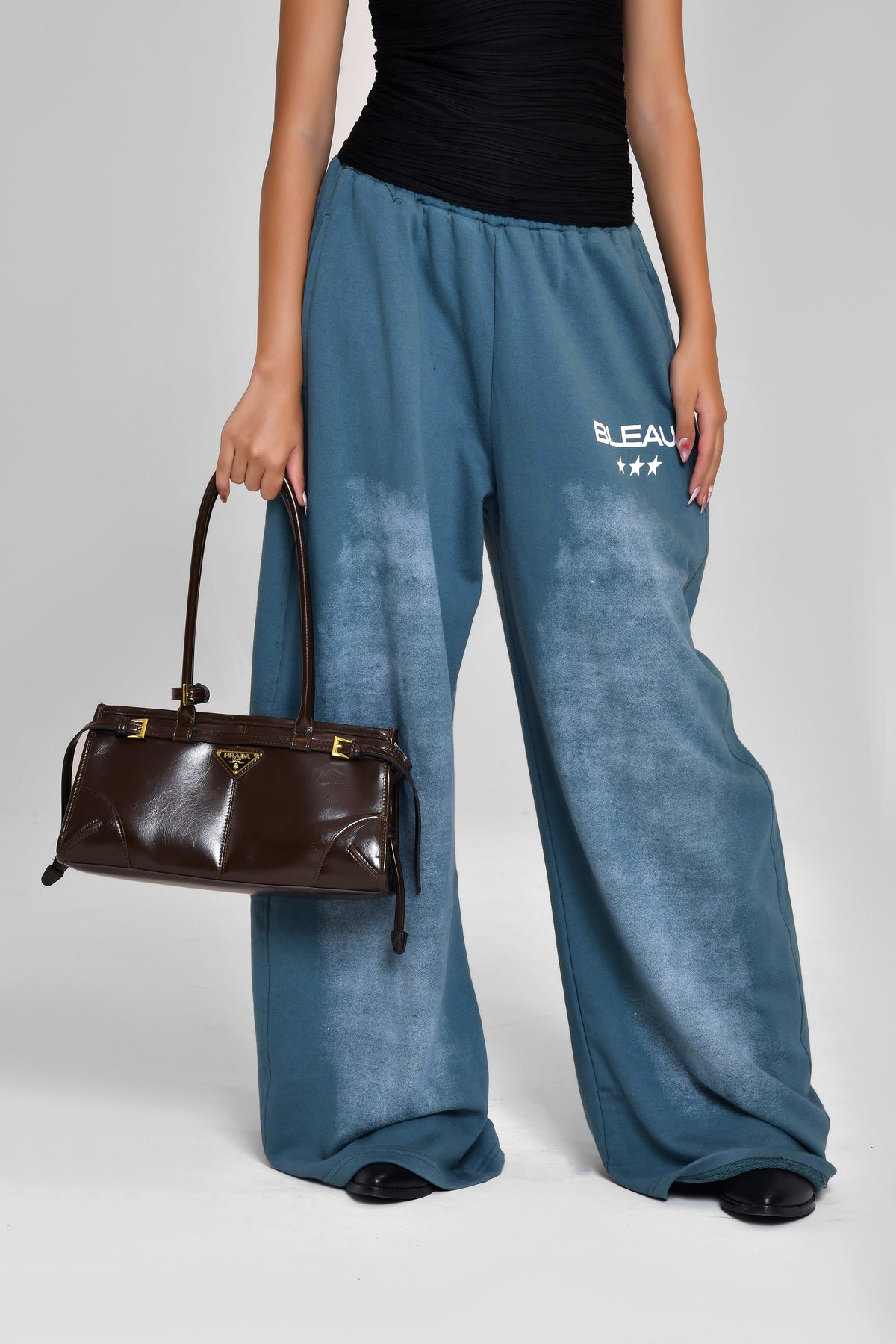 Teal Sprayed Sweatpants